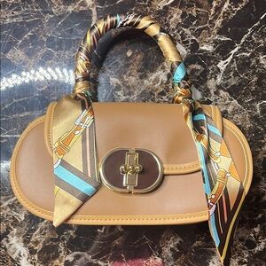 Elegant Tan Handbag with Scarf Accent
